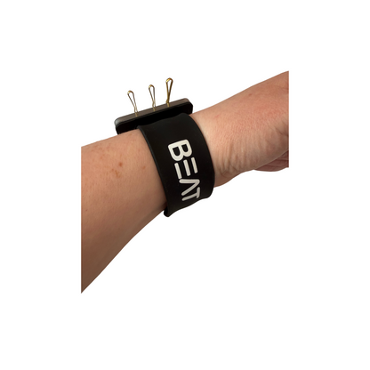 Slap band pin/grip holder